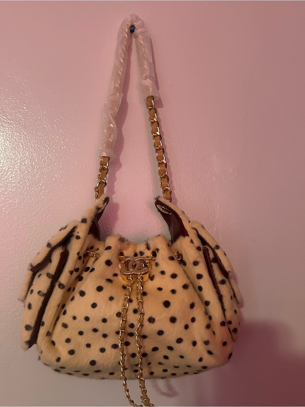 CHANEL Cream Faux Fur Drawstring Shoulder Bag with Black Spots and Gold Chain